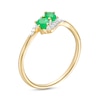 Thumbnail Image 3 of Oval Emerald and 1/20 CT. T.W. Diamond Bypass Ring in 10K Gold