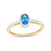 Thumbnail Image 1 of Oval Swiss Blue Topaz and White Lab-Created Sapphire Frame Ring in 10K Gold