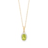 Thumbnail Image 1 of Oval Peridot and White Lab-Created Sapphire Frame Pendant in 10K Gold