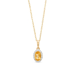 Oval Orange Citrine and White Lab-Created Sapphire Frame Pendant in 10K Gold