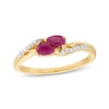 Thumbnail Image 1 of Pear-Shaped Ruby and 1/20 CT. T.W. Diamond Bypass Two Stone Ring in 10K Gold