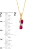 Thumbnail Image 3 of Pear-Shaped Ruby and Diamond Accent Swirl Two Stone Pendant in 10K Gold