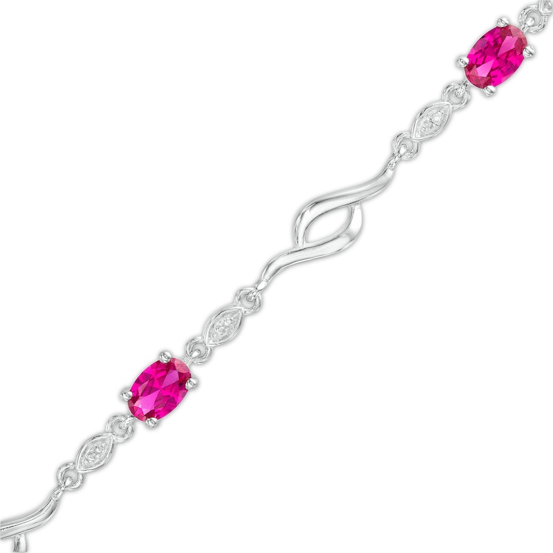 Main Image 1 of Oval Lab-Created Ruby and Diamond Accent Bypass Flame Bracelet in Sterling Silver - 7.25&quot;