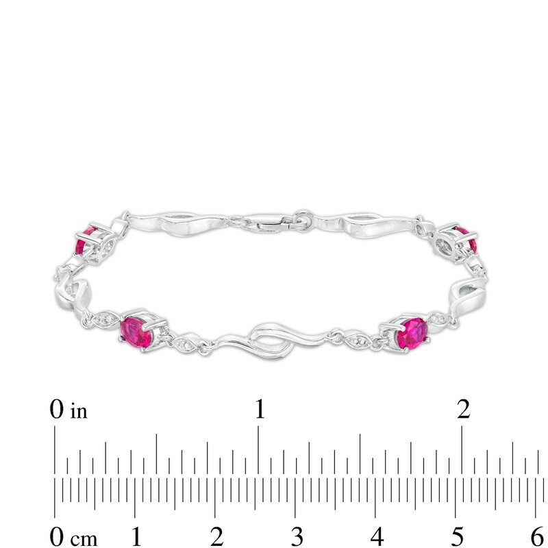 Main Image 3 of Oval Lab-Created Ruby and Diamond Accent Bypass Flame Bracelet in Sterling Silver - 7.25&quot;