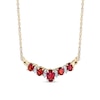 Thumbnail Image 1 of Oval Garnet and 1/8 CT. T.W. Diamond Alternating &quot;V&quot; Necklace in 14K Gold – 16&quot;