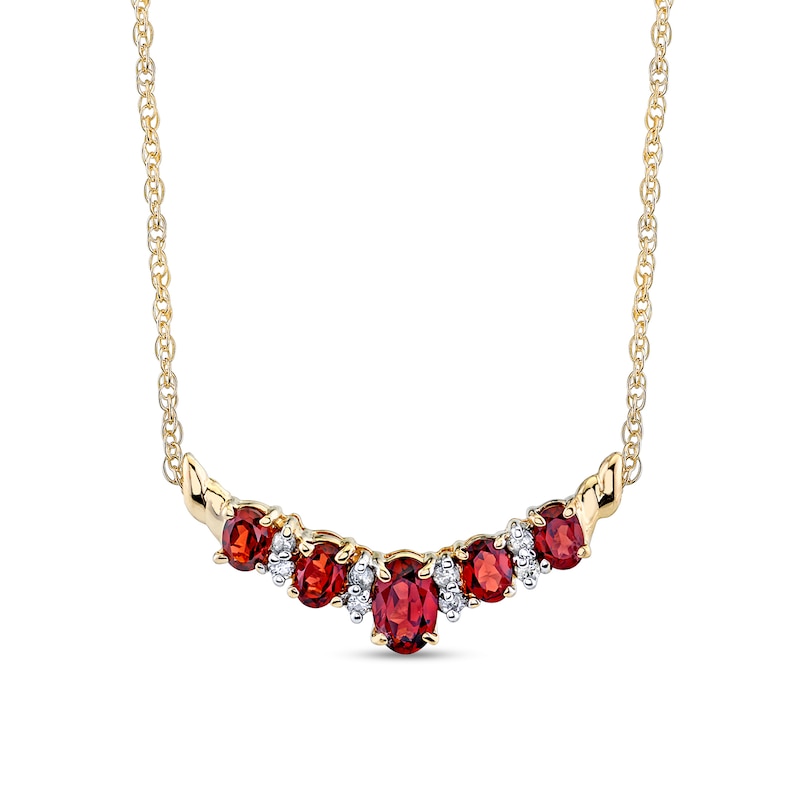 Main Image 1 of Oval Garnet and 1/8 CT. T.W. Diamond Alternating &quot;V&quot; Necklace in 14K Gold – 16&quot;