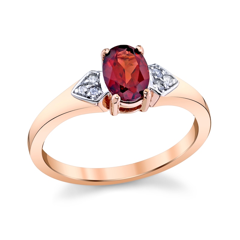 Oval Garnet and 1/20 CT. T.W. Diamond Tri-Sides Ring in 14K Rose Gold