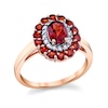 Thumbnail Image 1 of Oval Garnet, Rhodolite Garnet and 1/6 CT. T.W. Diamond Double Frame Ring in 14K Rose Gold