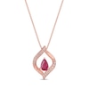 Thumbnail Image 1 of Pear-Shaped Ruby and 1/15 CT. T.W. Diamond Twist Frame Pendant in 10K Rose Gold