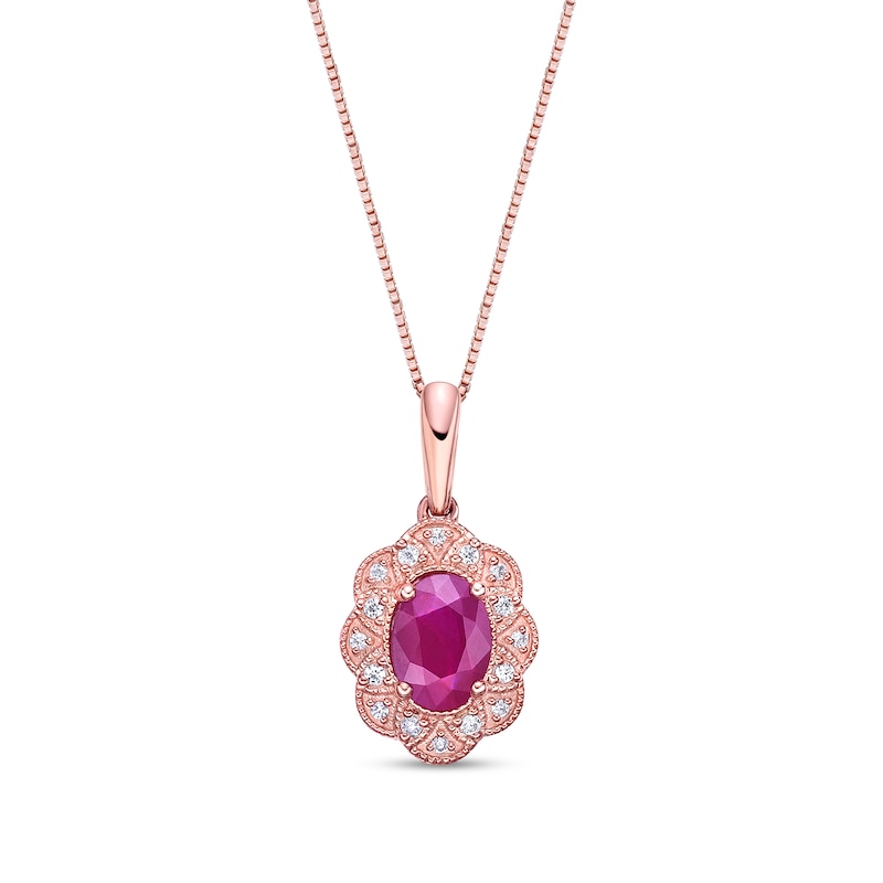 Main Image 1 of Oval Ruby and 1/15 CT. T.W. Diamond Scallop Frame Vintage-Style Flower Drop Pendant in 10K Rose Gold