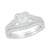 Thumbnail Image 0 of 1/5 CT. T.W. Heart-Shaped Multi-Diamond Frame Tapered Shank Bridal Set in Sterling Silver