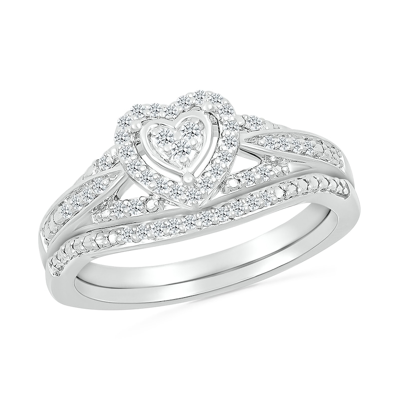 1/5 CT. T.W. Heart-Shaped Multi-Diamond Frame Tapered Shank Bridal Set in Sterling Silver