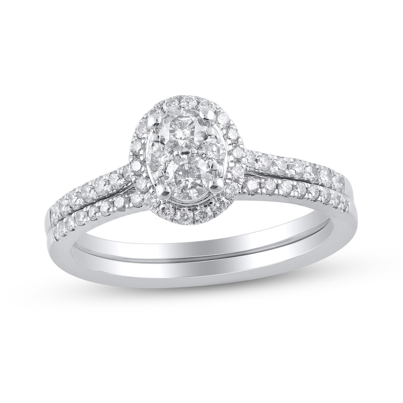 Main Image 1 of 1/2 CT. T.W. Oval Multi-Diamond Frame Bridal Set in Sterling Silver