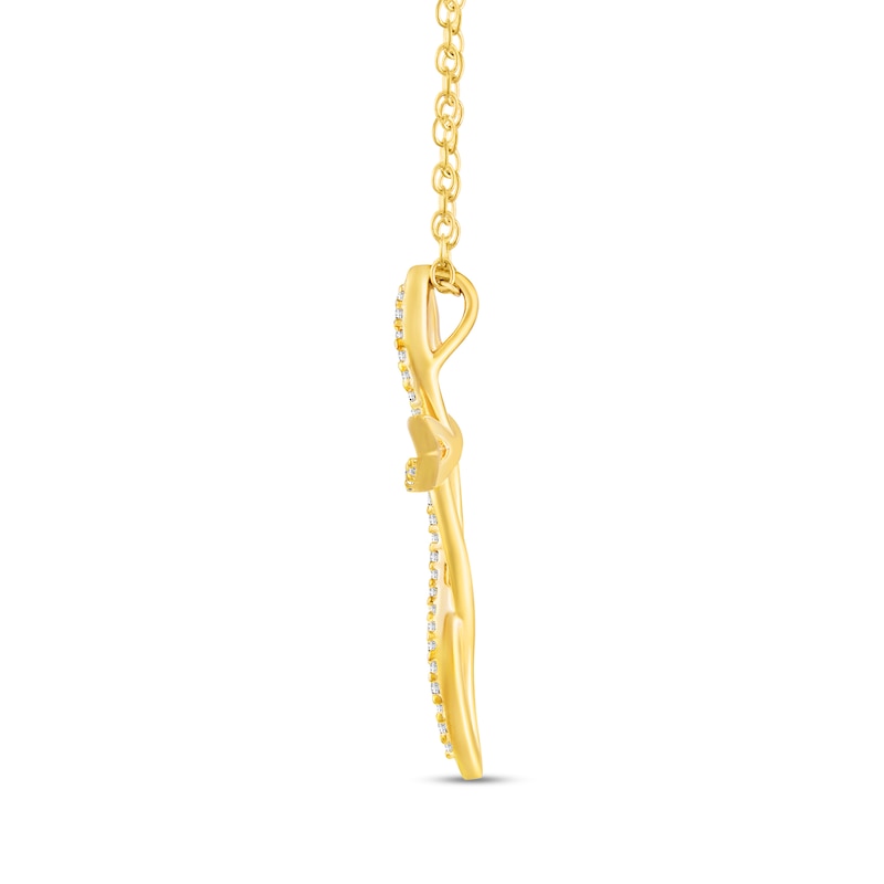 Main Image 3 of 1/6 CT. T.W. Diamond Twist Ribbon Cross Pendant in Sterling Silver with 14K Gold Plate