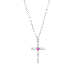 Ruby and 1/4 CT. T.W. Diamond Cross Pendant in Sterling Silver