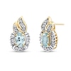 Thumbnail Image 1 of Oval Aquamarine and 1/3 CT. T.W. Baguette Diamond Frame Flame Stud Earrings in 14K Gold