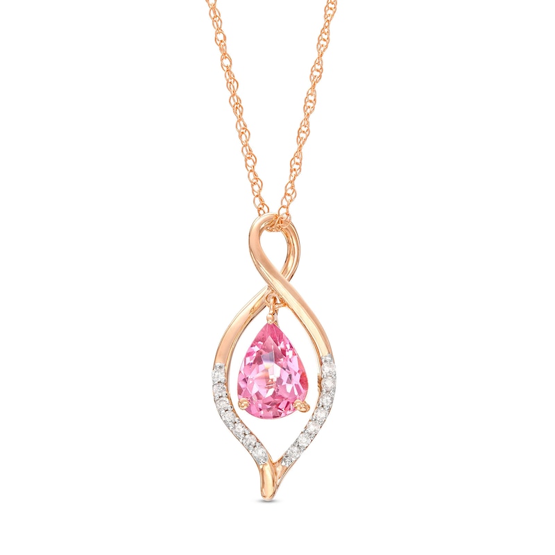 Main Image 1 of Pear-Shaped Garnet and 1/20 CT. T.W. Diamond Loop Pendant in 10K Rose Gold