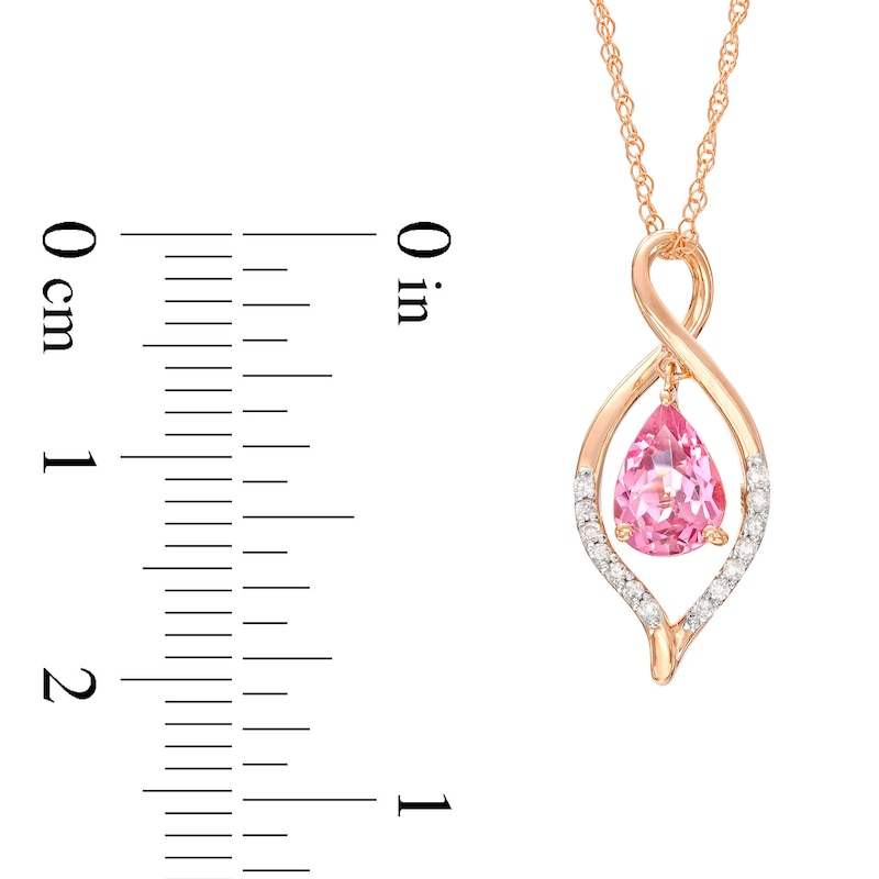 Zales Pear-Shaped Ruby and 1/20 Ct. T.W. Diamond Teardrop Pendant in 10K Rose Gold