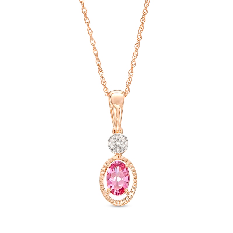 Main Image 1 of Oval Garnet and Multi-Diamond Accent Textured Open Frame Pendant in 10K Rose Gold