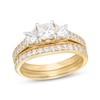 Thumbnail Image 0 of 1-1/2 CT. T.W. Princess-Cut Diamond Three Stone Vintage-Style Bridal Set in 14K Gold