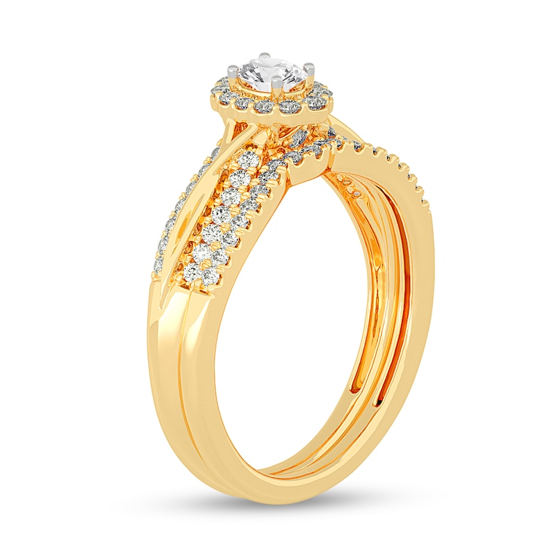 Main Image 2 of 1/2 CT. T.W. Oval Diamond Frame Overlay Bridal Set in 14K Gold