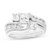 Thumbnail Image 0 of 1-1/2 CT. T.W. Princess-Cut Diamond Three Stone Bypass Bridal Set in 14K White Gold (H-I/I1)