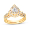 Thumbnail Image 1 of 3/4 CT. T.W. Pear-Shaped Diamond Double Frame Twist Shank Bridal Set in 14K Gold (I/SI2)