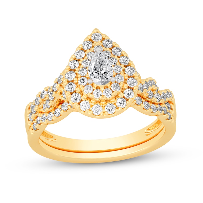 Main Image 1 of 3/4 CT. T.W. Pear-Shaped Diamond Double Frame Twist Shank Bridal Set in 14K Gold (I/SI2)