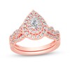 Thumbnail Image 1 of 3/4 CT. T.W. Pear-Shaped Diamond Double Frame Twist Shank Bridal Set in 14K Rose Gold (I/SI2)