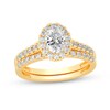 Thumbnail Image 1 of 1 CT. T.W. Oval Diamond Frame Bridal Set in 14K Gold (I/SI2)