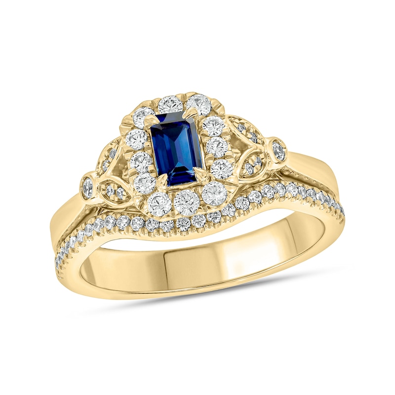 Main Image 1 of Emerald-Cut Blue Lab-Created Sapphire and 3/8 CT. T.W. Diamond Frame Floral Bridal Set in 10K Gold