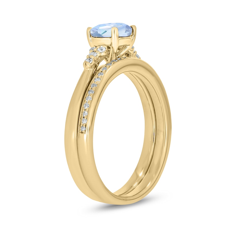 6.0mm Aquamarine and 1/5 CT. T.W. Diamond Tri-Sides Bridal Set in 10K Gold