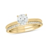 Thumbnail Image 1 of 6.0mm White Lab-Created Sapphire and 1/5 CT. T.W. Diamond Band Bridal Set in 10K Gold