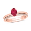 Thumbnail Image 1 of Oval Lab-Created Ruby and 1/5 CT. T.W. Diamond Band Bridal Set in 10K Rose Gold