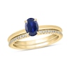 Thumbnail Image 1 of Oval Blue Lab-Created Sapphire and 1/5 CT. T.W. Diamond Band Bridal Set in 10K Gold