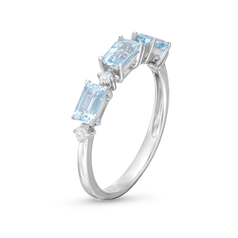 Main Image 3 of Sideways Emerald-Cut Aquamarine and 1/15 CT. T.W. Diamond Station Three Stone Ring in 14K White Gold