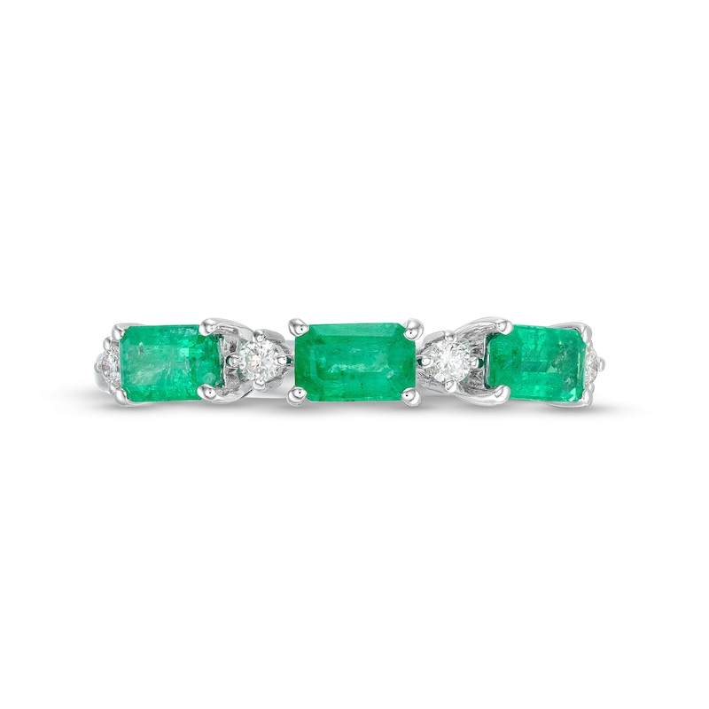 Sideways Emerald-Cut Emerald and 1/15 CT. T.W. Diamond Station Three Stone Ring in 14K White Gold