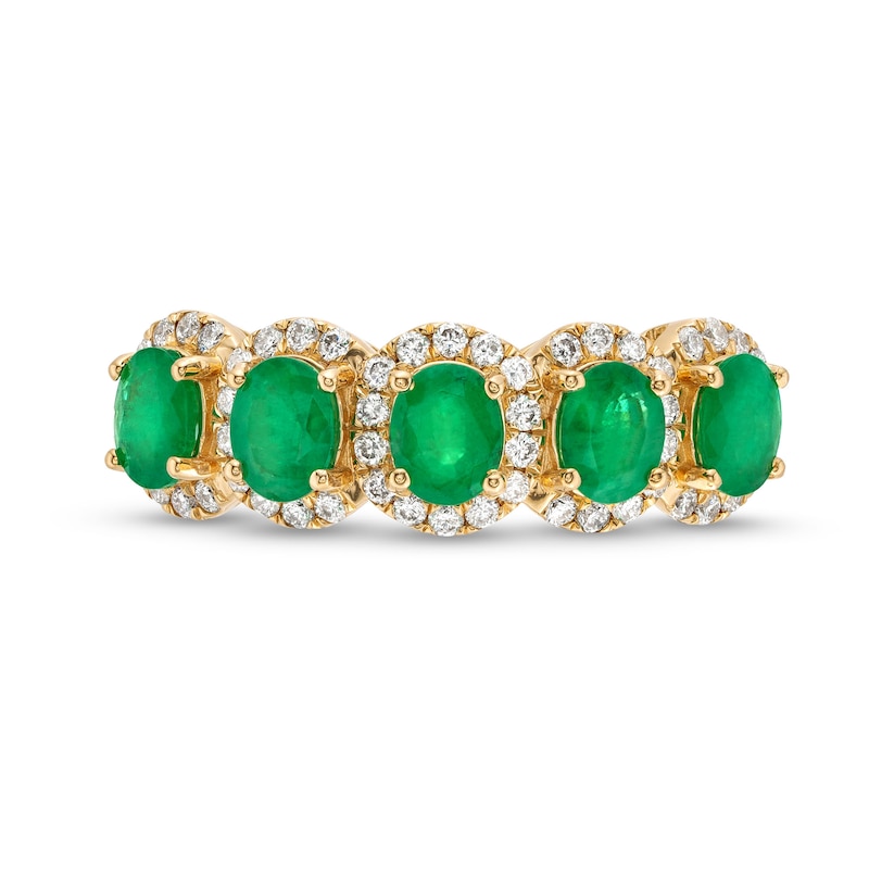 Oval Emerald and 3/8 CT. T.W. Diamond Frame Five Stone Ring in 14K Gold