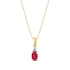 Thumbnail Image 1 of Oval Ruby and 1/20 CT. T.W. Diamond Tri-Top Pendant in 14K Gold