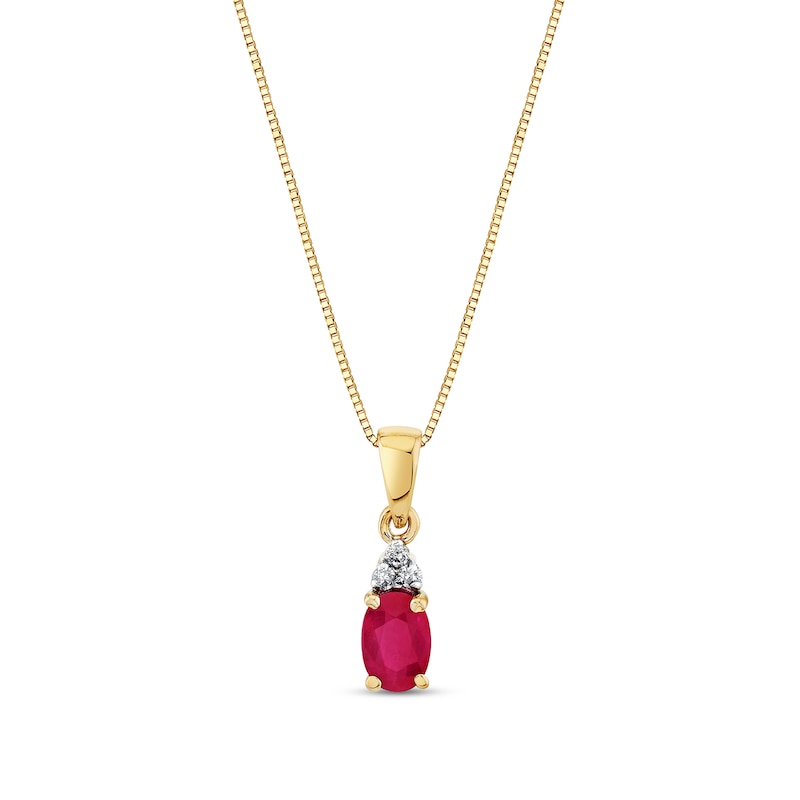 Main Image 1 of Oval Ruby and 1/20 CT. T.W. Diamond Tri-Top Pendant in 14K Gold