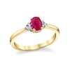 Thumbnail Image 0 of Oval Ruby and 1/10 CT. T.W. Diamond Tri-Sides Ring in 14K Gold