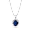 Thumbnail Image 0 of Oval Blue Sapphire and 1/5 CT. T.W. Diamond Sunburst Frame Pendant in 14K White Gold