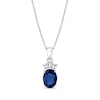 Thumbnail Image 1 of Oval Blue Sapphire and 1/15 CT. T.W. Baguette-Cut Diamond Fan-Top Pendant in 14K White Gold