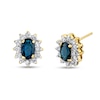 Thumbnail Image 1 of Oval Blue Sapphire and 1/2 CT. T.W. Diamond Sunburst Frame Stud Earrings in 14K Gold