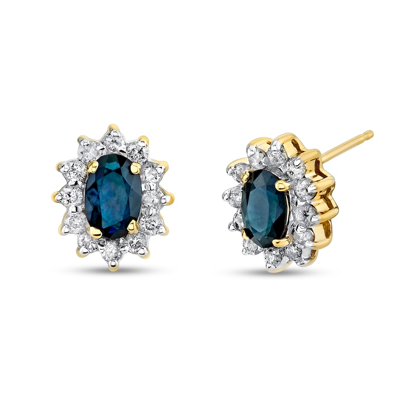 Main Image 1 of Oval Blue Sapphire and 1/2 CT. T.W. Diamond Sunburst Frame Stud Earrings in 14K Gold