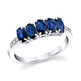 Oval Blue Sapphire and 1/20 CT. T.W. Diamond Five Stone Ring in 14K White Gold