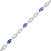 Thumbnail Image 1 of Oval Blue Lab-Created Sapphire and Diamond Accent Infinity Braid Line Bracelet in Sterling Silver - 7.25"