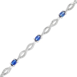 Oval Blue Lab-Created Sapphire and Diamond Accent Infinity Braid Line Bracelet in Sterling Silver - 7.25&quot;