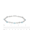 Thumbnail Image 3 of Oval Swiss Blue Topaz and Diamond Accent Infinity Braid Line Bracelet in Sterling Silver - 7.25"