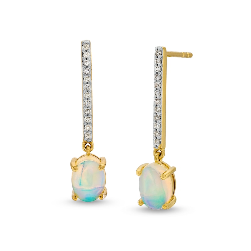 Oval Opal and 1/8 CT. T.W. Diamond Stick Drop Earrings in 10K Gold